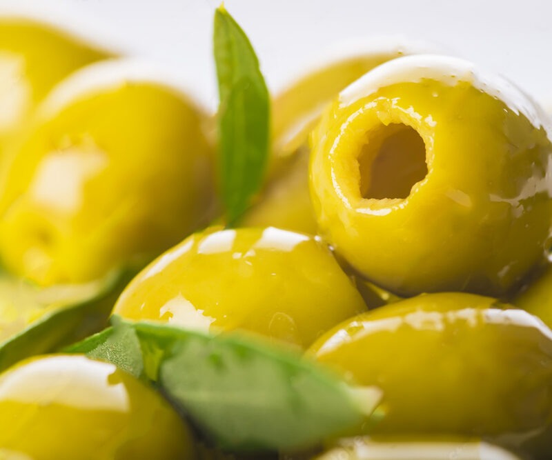 Aceitunas gordales deshuesadas,  marinadas con aceite de oliva y oregano.